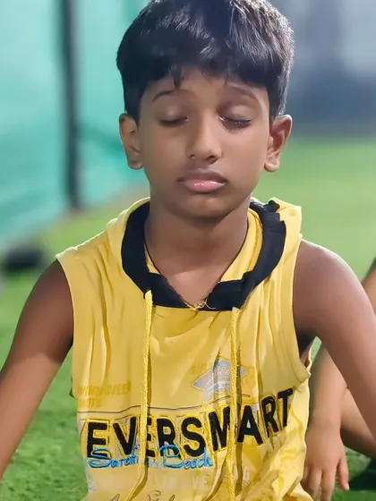 A moment of peace and focus. This young boy is deep in meditation, a practice we incorporate to help our kids build mental strength and resilience.