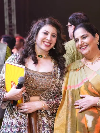 A happy moment captured with Vandana Pathak from the Khichdi team backstage at the Navratri event.