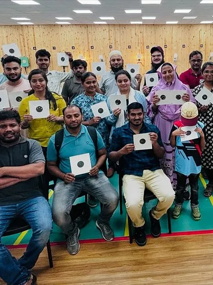 We specialize in creating memorable and effective corporate team-building events. Here, a team from Pixcellence Tech proudly displays their targets after a successful session focused on improving concentration and fostering friendly competition.