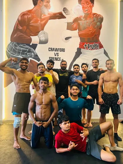 This is my squad, my wolfpack. The results of our hard work are carved into our physiques. We are a team of artists, and the octagon is our canvas.