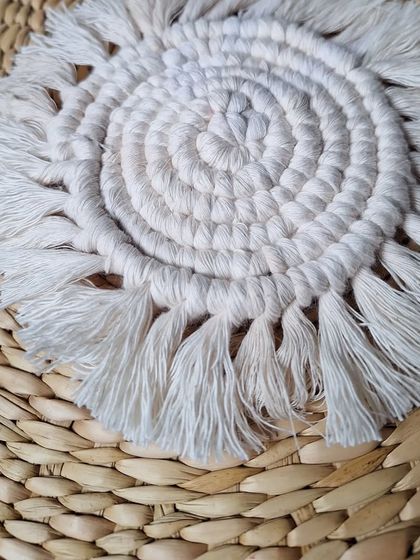 A top-down view of the spiraled coaster, highlighting the beautiful pattern created by the knots.