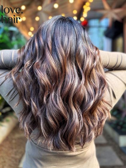 A close-up on the back of the 'old money brunette' balayage, showcasing the intricate blend of cool and warm brown tones.