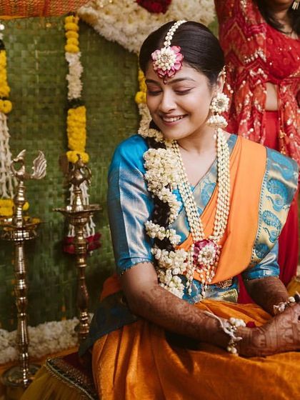 A beautiful portrait of the bride at her South Indian themed Haldi. The traditional attire and decor came together perfectly.
