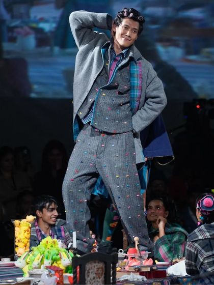 A fun and quirky look from the Lakme Fashion Week runway. I incorporated hair rollers into the final style for this model, creating a playful and unexpected element that matched the whimsical theme of the show.