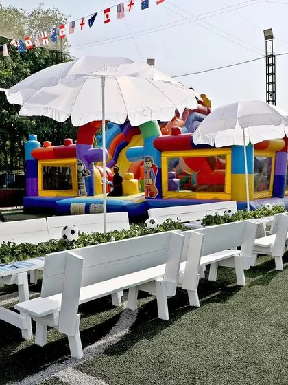 A large, colourful bouncy castle is always a party favourite. This one was part of a fun-filled football-themed birthday celebration.