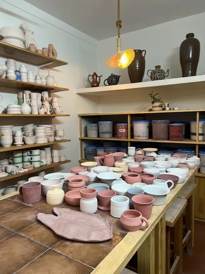 Welcome to the organised chaos of our glaze room! This is where all the student pieces wait to get fired up. Seeing these shelves full of your creations is honestly the best part of our job.