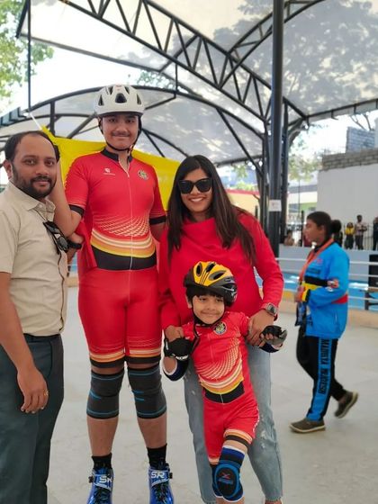 A team photo with our champions Shubham and Rayaansh at the rink. Dressed in our club colors, this picture captures the spirit of camaraderie and shared purpose before a competition.