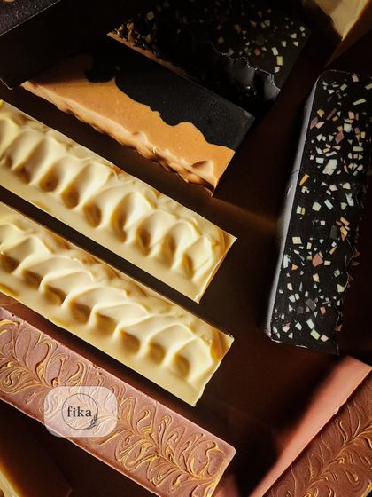 Ever wonder what pure, unadulterated luxury feels like? I've captured it in these beautifully textured and colored soap bars. The ingredients are so fancy, they practically whisper sweet nothings to your skin.