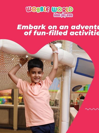 This young adventurer is navigating one of our soft play obstacle courses. These structures are designed to challenge kids and build their confidence.