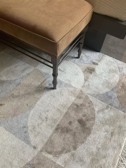 A detail of a rug with a geometric pattern, showing how I use textiles to add layers of texture and interest to a floor.