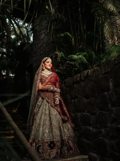 The bride descending a staircase, looking every bit a royal princess. I work with photographers to find the best angles and lighting for these shots.