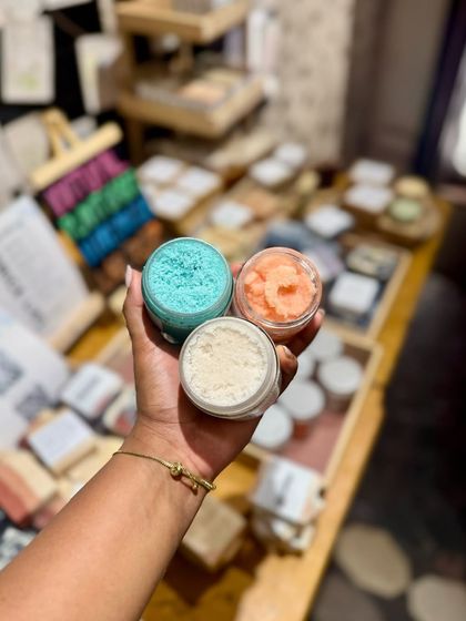 Our colorful body polishes on display at our pop-up. Customers love being able to see the textures and smell the scents in person.