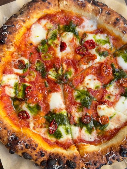 Warning: my pizza may cause extreme happiness and cravings for more. You've been warned. This Sundried Tomato and Basil Pesto pizza is especially addictive.