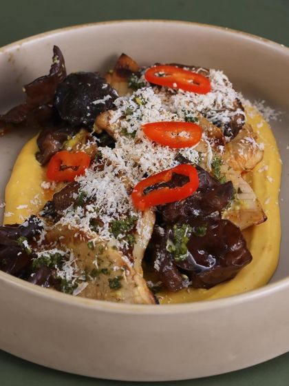 Our Chargrilled Exotic Mushrooms are a celebration of earthy flavors. A mix of wild mushrooms is served on a yellow chili and feta emulsion, then finished with smoked bandel cheese and a picante salsa.