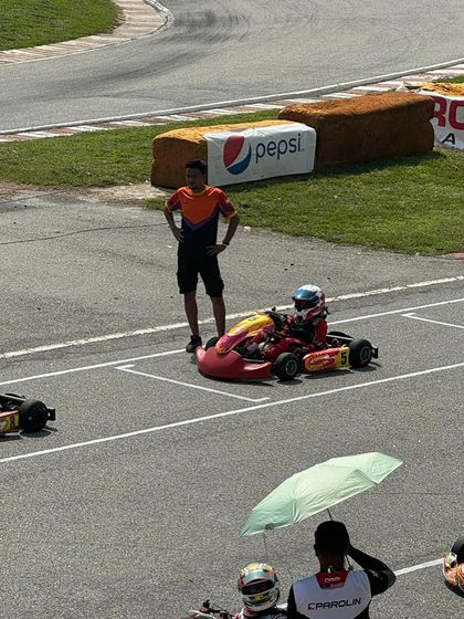 A driver on the starting grid at the Asia Max Trophy in Malaysia.