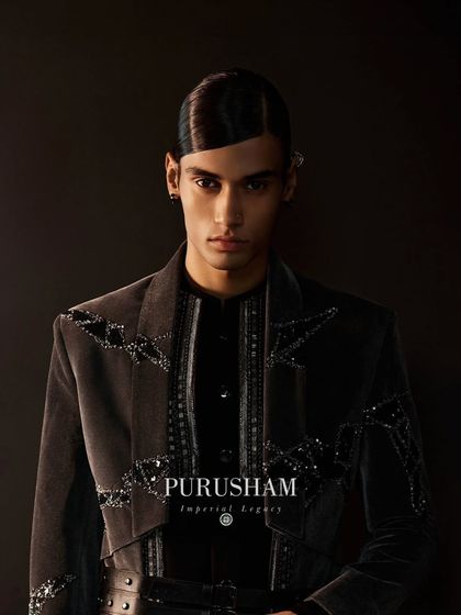 Hand-embroidered in velvet, my 'X' ensembles are designed to set fashion trends. This cropped grey jacket with intricate black sequin work is a statement of modern luxury.