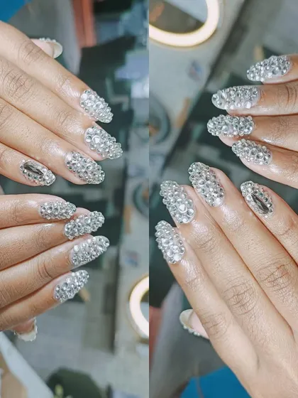 For those who love ultimate glamour, I create full-coverage rhinestone nail art. Each stone is placed by hand to create a dazzling, light-catching effect that is perfect for special occasions or making a bold statement.