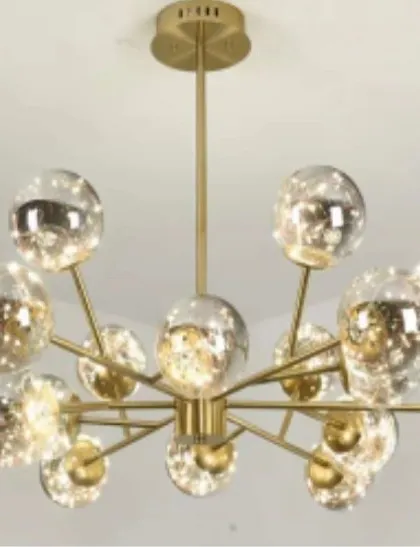 A sputnik-style chandelier with fairy lights inside smoked glass globes. This design offers a modern twist on a classic, providing a starry, diffused light.