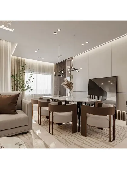 This view shows the integration of the dining and living areas, perfect for modern open-concept homes. A sculptural piece on a marble pedestal acts as a stylish divider between the zones.