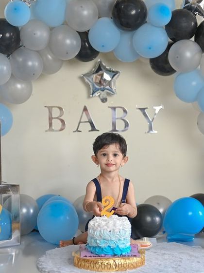 A duplicate of image 23, a fun second birthday cake smash.