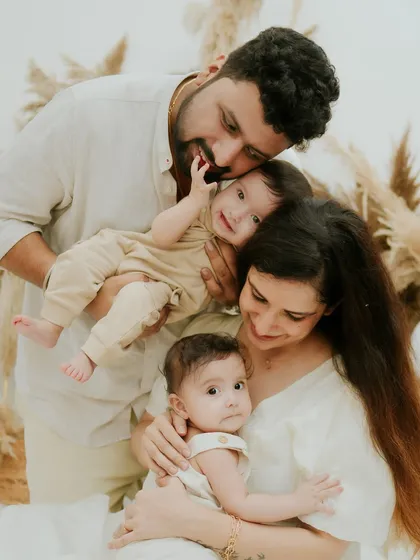 A family portrait is more than just a photo; it’s a snapshot of your love story. Here, with this beautiful family and their twins, we captured the gentle chaos and overwhelming love that fills their home.