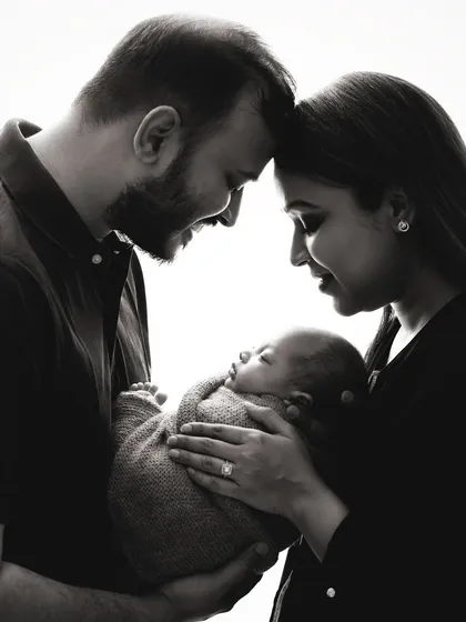 A backlit family portrait in black and white. This technique is challenging but creates stunning, emotional results that are worth the effort.