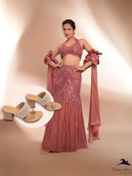 These versatile Moti Heels can be paired with a glamorous lehenga just as easily as a saree, providing a comfortable yet stylish footwear option for any festive event.