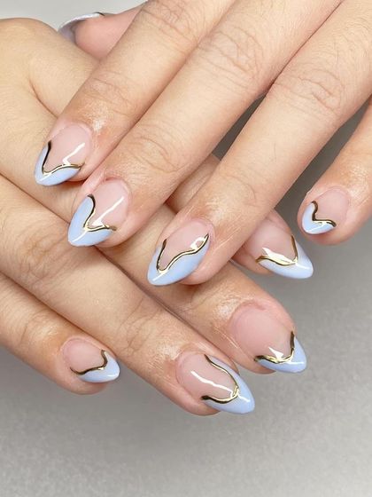 A chic and minimalist design with a pastel blue base and a delicate, abstract gold line.