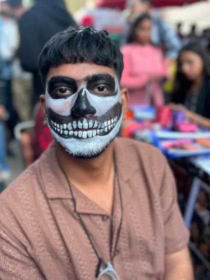 The classic skull face paint. It's a popular request, especially around Halloween, and it looks great on guys.