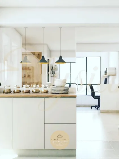 A luxurious kitchen with a neutral color palette. The clean, handleless cabinets and integrated appliances create a sleek, minimalist look, while the wooden countertop adds a touch of warmth.