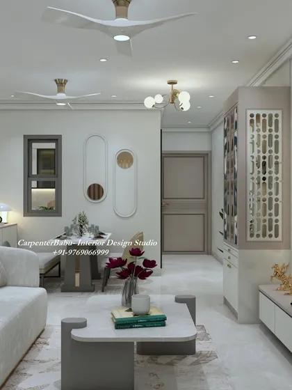An overview of the living and dining space, showing a cohesive design with a muted color palette, clean lines, and modern furniture. The space feels open, calm, and uncluttered.