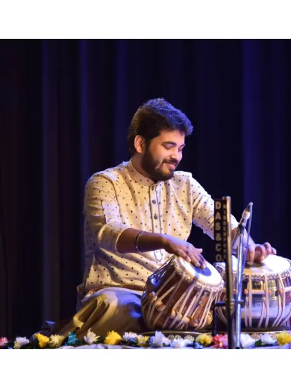 A moment of connection with my tabla during a performance. It often feels like the instrument has its own voice.