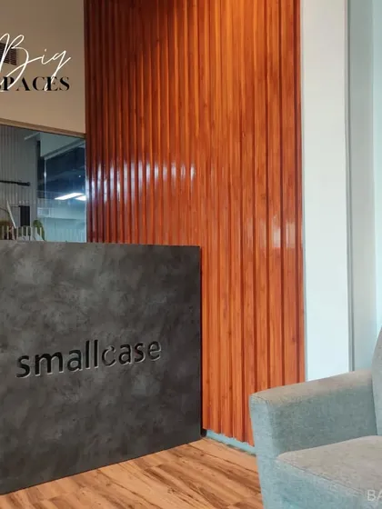 First impressions matter, especially in business. We designed the reception for Smallcase with a mix of industrial concrete and warm wood fluting to create a welcome area that is modern, professional, and on-brand.