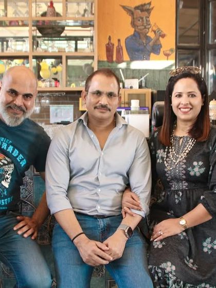 A happy group of friends and colleagues at a social event. This shows my versatility in covering both personal and professional gatherings.