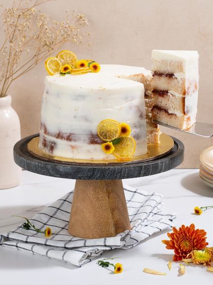 A dash of sweet with a tangy zest. My Lemon & Berry Cake has moist lemon and vanilla cake layers, a homemade berry compote filling, and a light cream cheese frosting.