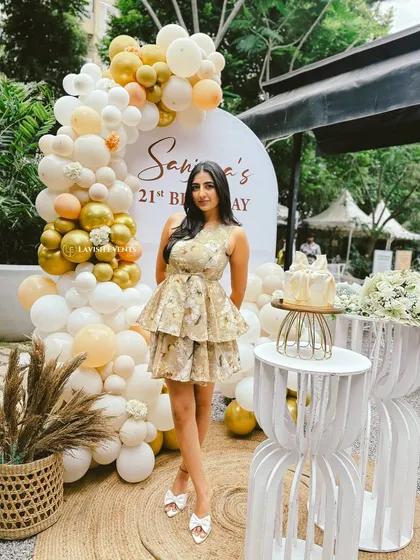Another look at the stylish outdoor birthday, showing how the decor complements the natural surroundings.