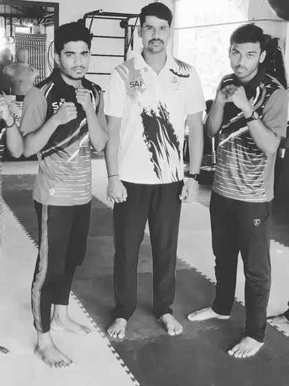 A black and white shot of me with some of the senior fighters from Team RBA. We train together as a unit.