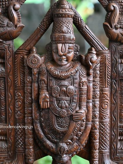 A close-up of a 26-inch Shri Venkatajalapathy (Tirupati Balaji) statue. The fine finishing highlights the detailed carvings of the deity's ornaments and the arch that frames him.