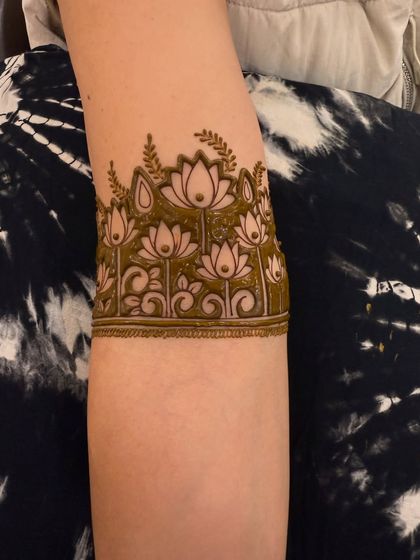 A collection of designs with fresh henna paste, showing the clean lines and 3D effect before the paste dries and falls off.