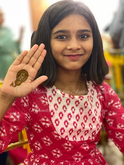 The same happy client showing off her cute little peacock mehendi. I love creating designs for kids too.