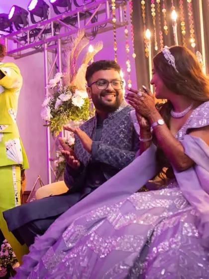 A live band interacting with the bride and groom, creating a personal and engaging entertainment experience. We work with the best artists to match your event's vibe.