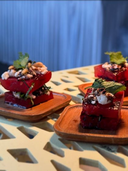 A refreshing bite-sized appetizer of watermelon and feta cheese stacks. This classic Mediterranean combination of sweet and salty is perfect for a summer event.