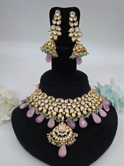 A lovely Polki set with pastel pink drops and mint green accents in the jhumkas. This shows my custom color combinations.