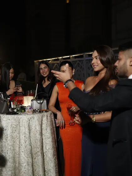 Entertaining a group of influencers and celebrities, including Esha Deol, at a private event. My job is to create a buzz and give these well-known personalities an experience they've never had before.