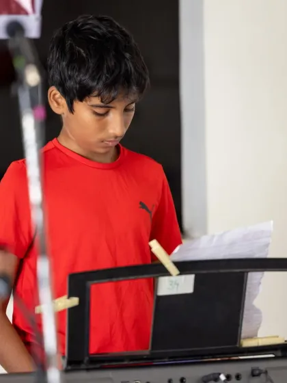 Another shot of our focused keyboard player, reading his sheet music as he performs for the residents.
