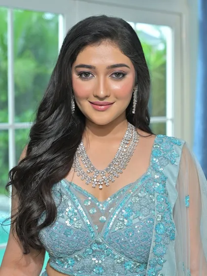 A close-up of the layered zircon necklace, showing its intricate design and brilliant sparkle. This is the perfect piece for a bride's reception or any glamorous special occasion.