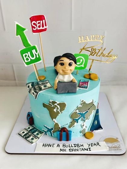 "Have a Bullish Year!" A stock market-themed cake for a trader, complete with buy/sell signs, dollar bills, and a world map.