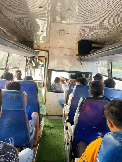 On the road in Goa. Our all-inclusive tours cover all local travel, ensuring the team gets to the ground and back to the bungalow comfortably in our team bus.