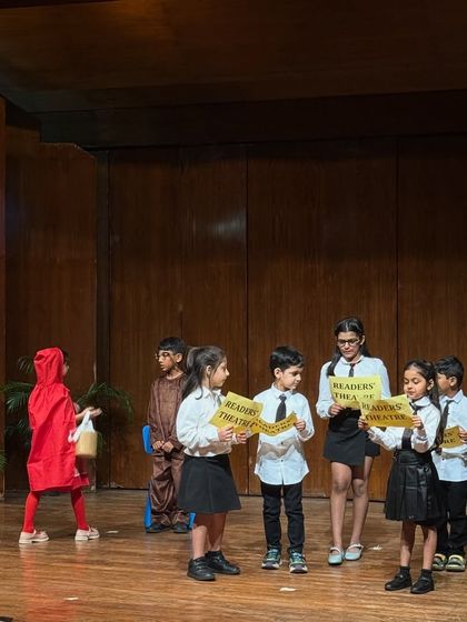 Our students engage in Reader's Theatre, a wonderful activity that builds reading fluency, listening skills, and expressive speaking without the pressure of memorizing lines.