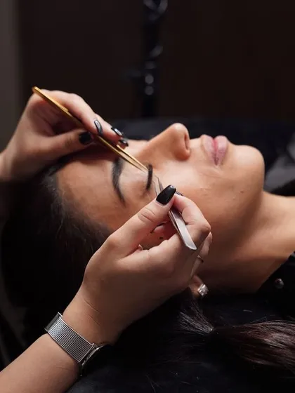 Who's ready to become a lash master? This close-up shot shows the precision and artistry involved in applying eyelash extensions, a key skill taught in our course.